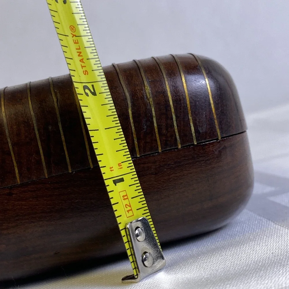 Hand carved 2 piece wood box with metal hinge, hook and metal ribs on lid